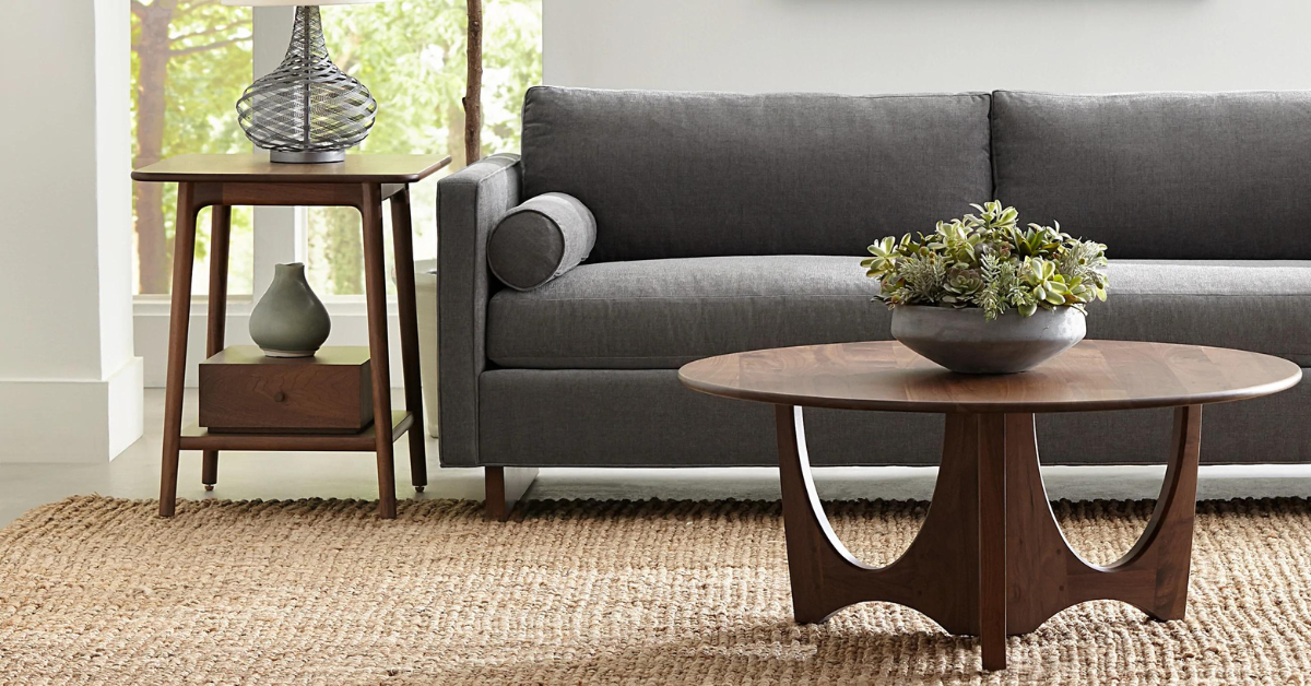 A coffee table, end table, and gray couch