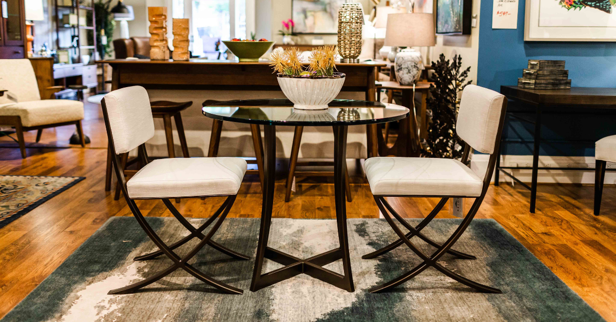 A beautiful dining table alongside matching dining chairs